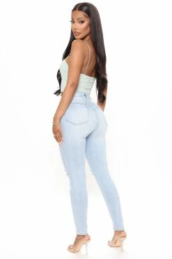 Fashion Nova Skinny Jeans Can't Keep A Secret Ripped Ankle Jeans - Light Blue Wash