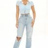 Best deal 👍 Fashion Nova Classic Tapered Ripped Mom 👖 Jeans - Light Blue Wash 🛒 2 Fashion Nova Classic Tapered Ripped Mom Jeans - Light Blue Wash