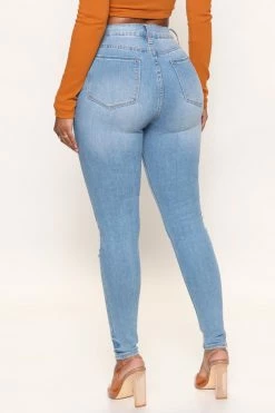 Fashion Nova Sneaking Out Stretch Skinny Jeans - Medium Wash