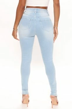 Fashion Nova Manchester Vintage Stretch Fray Hem Skinny Jeans - Light Blue Wash
