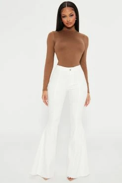 Fashion Nova Saddle Star Extreme Flare Jeans - White