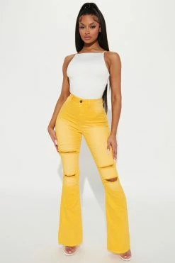 Fashion Nova Eye Candy Stretch Flare Jeans - Yellow