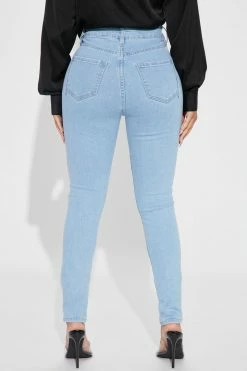 Fashion Nova Keep A Secret Stretch Skinny Jeans - Light Blue Wash