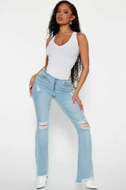 Fashion Nova Flare Jeans Britney Low Rise Ripped Flared Jeans - Light Blue Wash