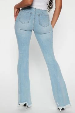 Fashion Nova Flare Jeans Britney Low Rise Ripped Flared Jeans - Light Blue Wash