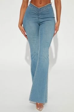 Fashion Nova Workin' It Cinched Low Rise Flare Jean - Medium Wash Flare Jeans