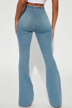 Fashion Nova Workin' It Cinched Low Rise Flare Jean - Medium Wash Flare Jeans