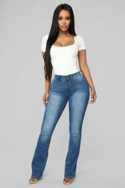 Fashion Nova Getting The Boot Mid Rise Jeans - Medium Blue Bootcut Jeans