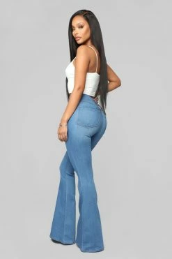 Fashion Nova Deep In My Soul Flare Jeans - Medium Blue Wash Skinny Jeans
