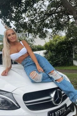 Fashion Nova Distressed Crossover Straight Leg Jeans - Light Blue Wash